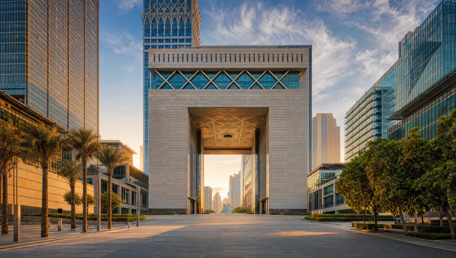 The Gate Building and surrounding towers of the Dubai International Financial Centre at golden hour